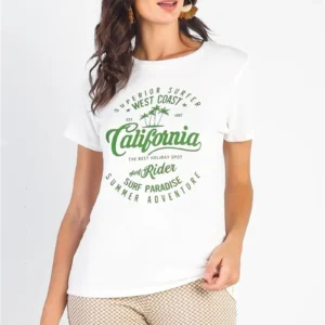 A woman wearing a white t-shirt with green lettering.