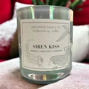 A candle sitting on top of a table.