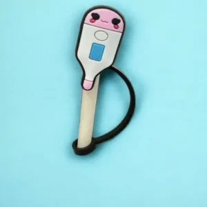 A pink and white toothbrush on top of a blue background.