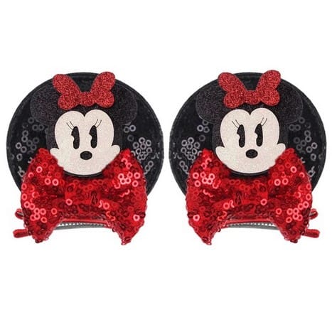 Pair of Minnie Mouse hair clips with bows.