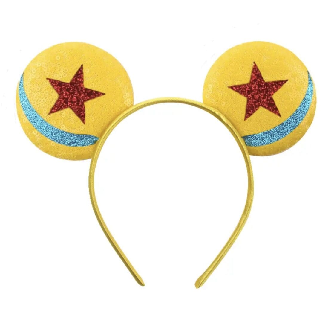 Yellow mouse ears with red stars.