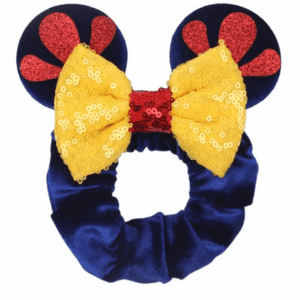 Blue velvet headband with yellow bow and red ears.