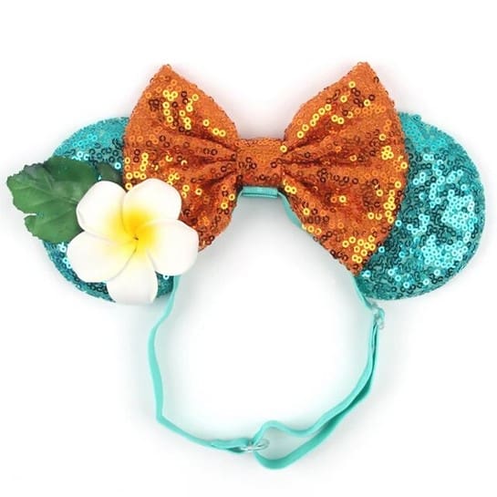 Orange and teal sequin headband with flower.