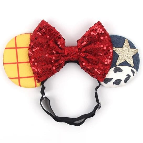 Red sequined bow headband with cowboy ears.