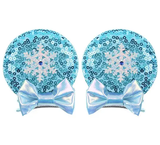 Blue snowflake hair clips with bows.